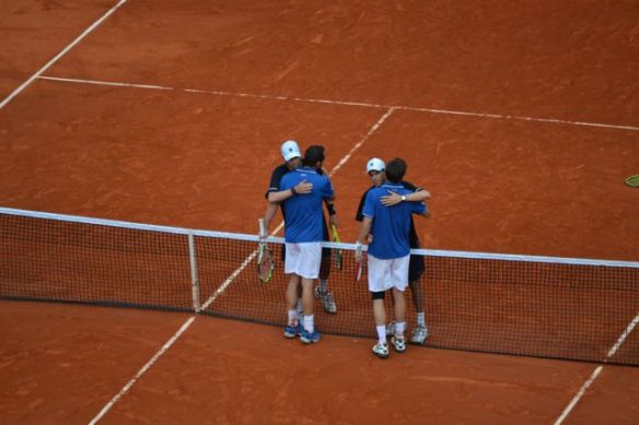 I think the French guys were going in for cheek kisses, but the Bryan brothers hugged it out